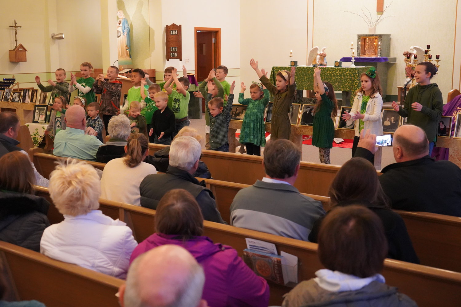Children of the parish sing an Irish Lullaby after Mass.